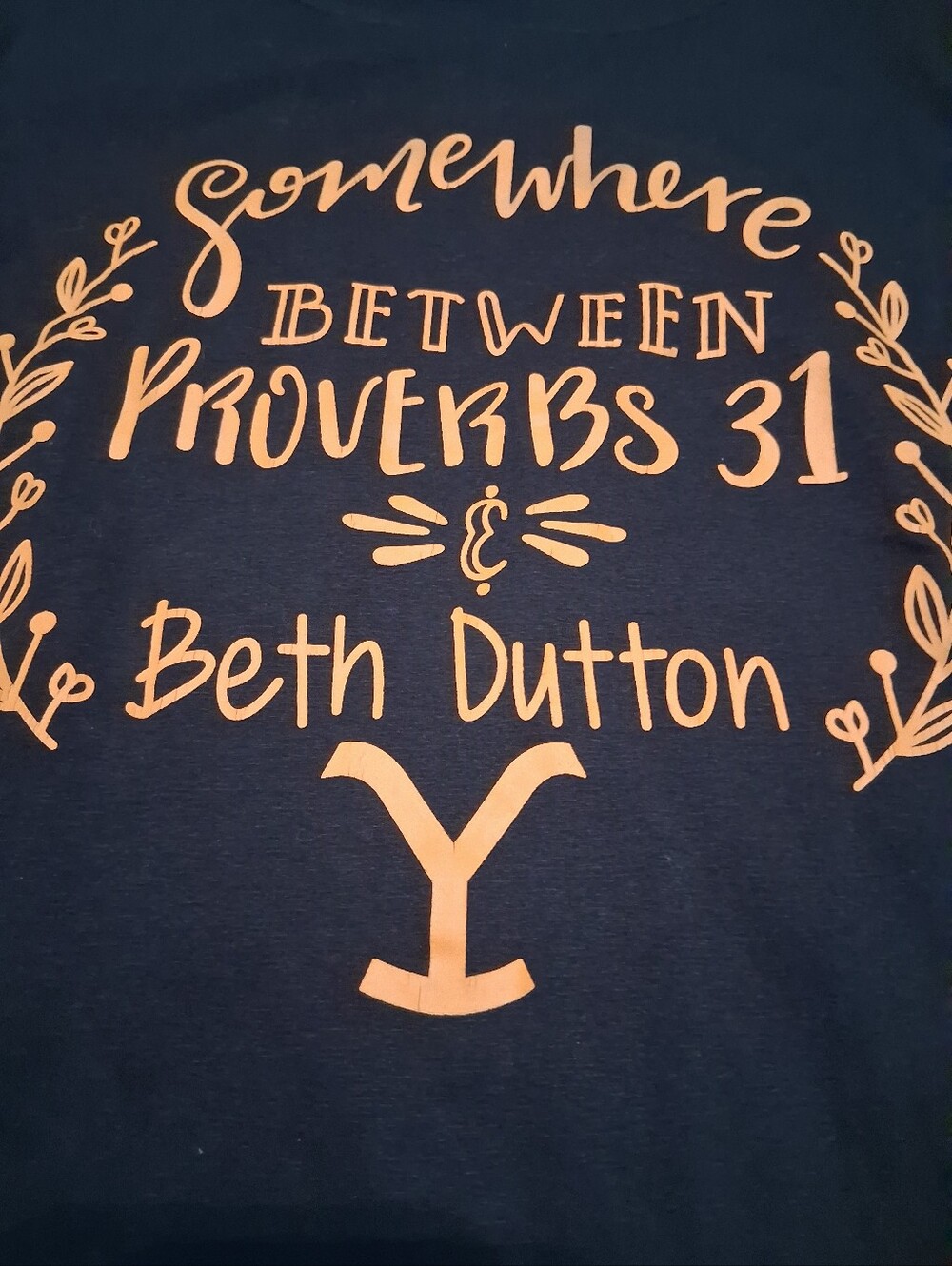 Somewhere Between Proverbs 31 Beth Dutton Graphic Tee - Yellowstone